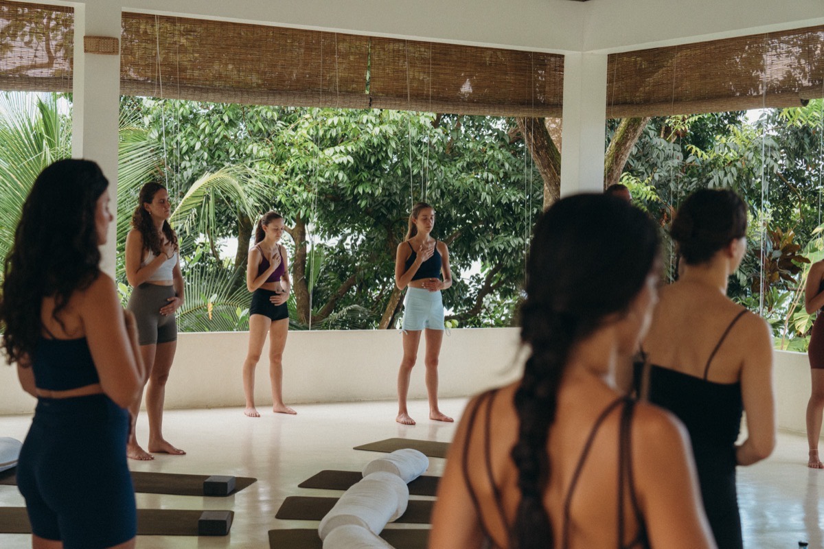 Yin yoga vs vinyasa, a still, passive hold and a flowing practice at Lanka Yoga, Sri Lanka