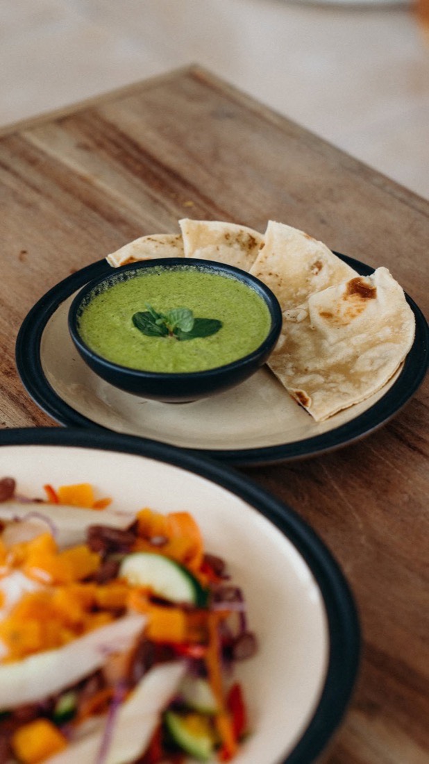 A fresh herb dip with flatbread and a colourful rainbow salad at Lanka Yoga