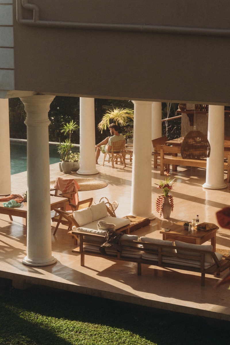 The open-air lounge and pool deck at the Lanka Yoga retreat campus on Koggala Lake, Sri Lanka