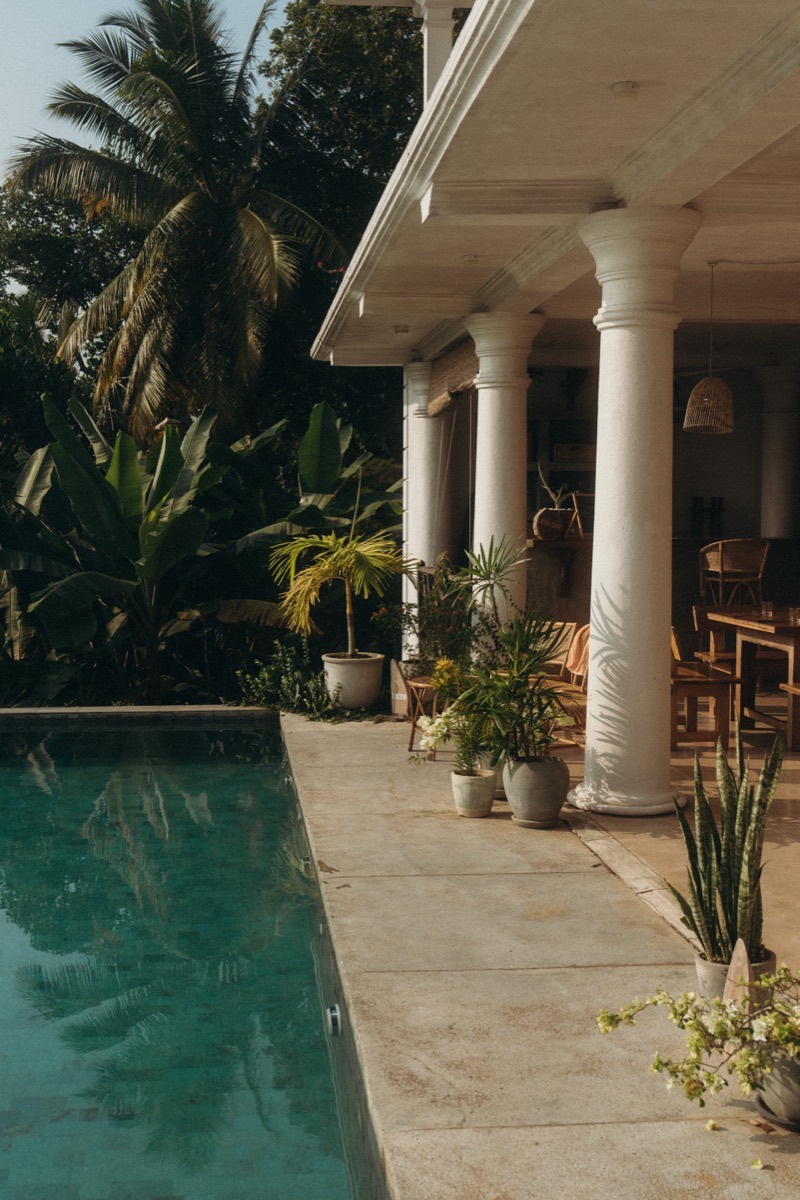 The pool and open-air colonnade at the Lanka Yoga retreat campus, Sri Lanka