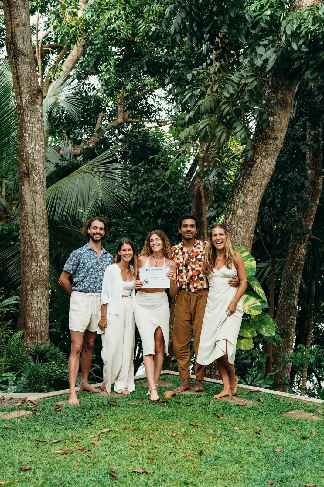 Yoga teacher training graduates with their certificates at Lanka Yoga in Sri Lanka